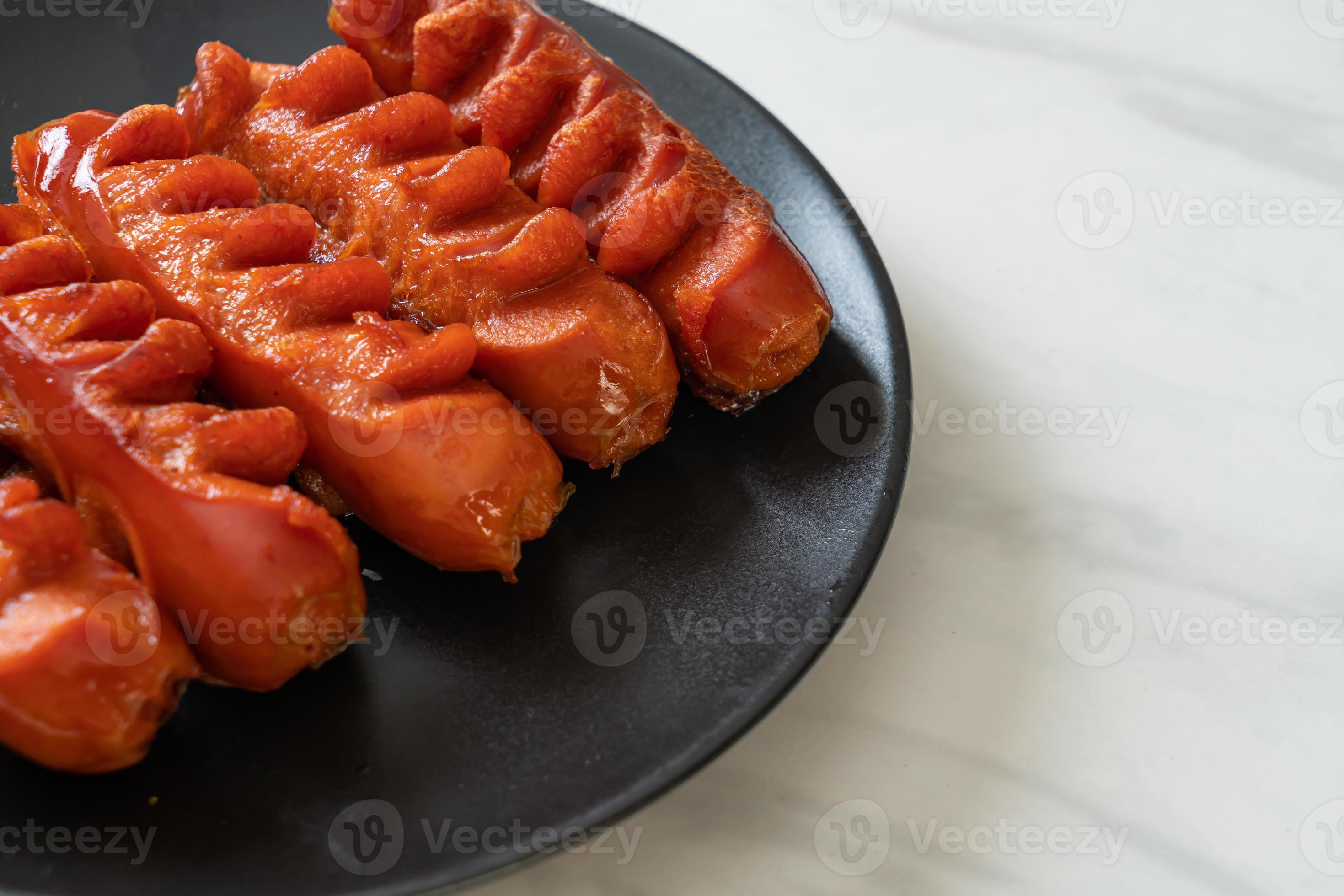 deep fried sausage skewer on plate 11219512 Stock Photo at Vecteezy