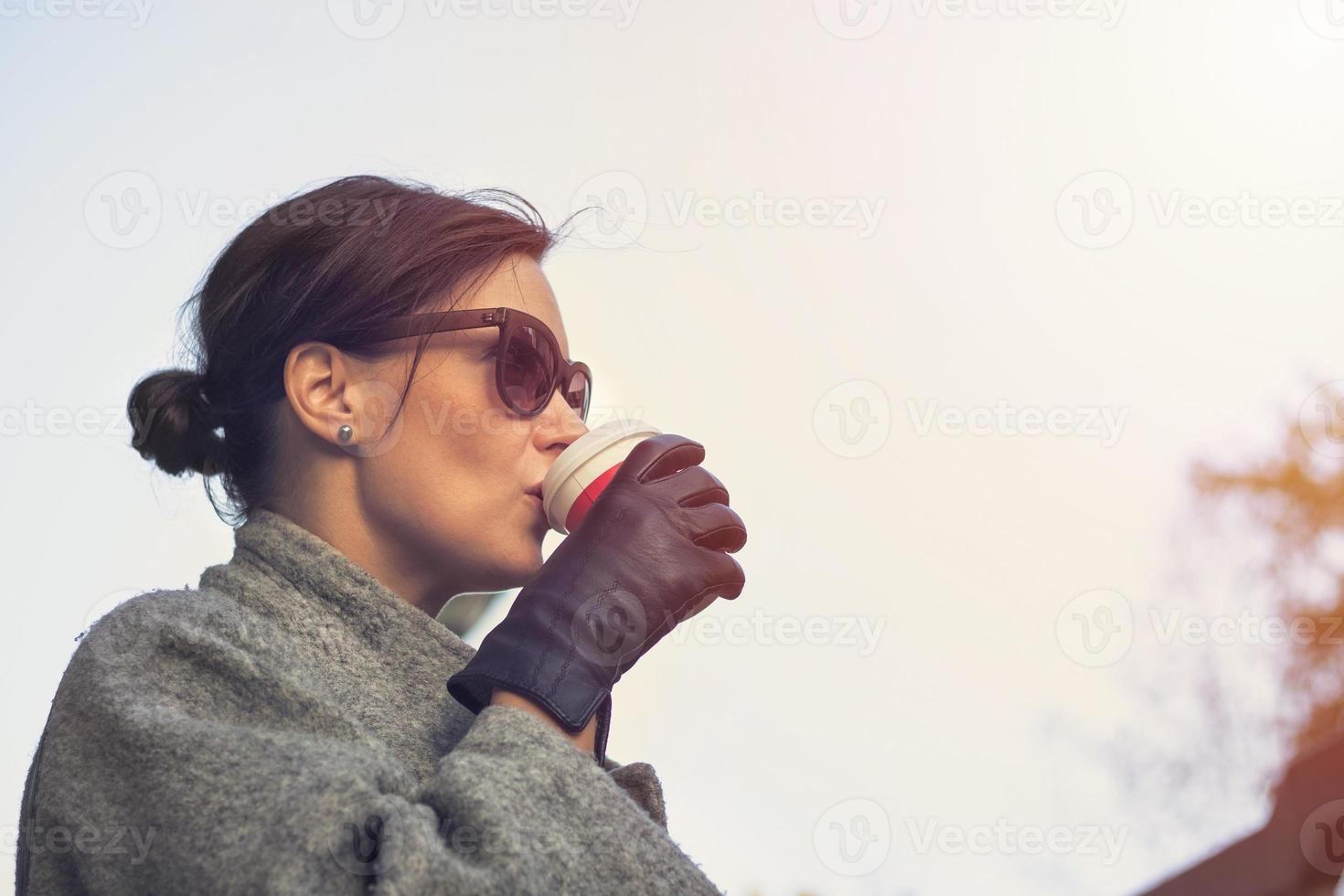 Starting a busy day with cup of coffee. photo