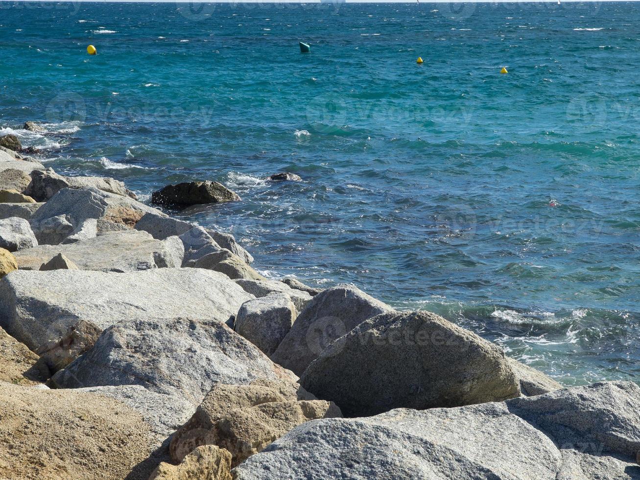 Barcelona city at the mediterranean sea photo