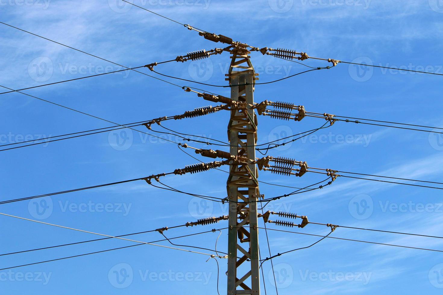 Electrical wires carrying high voltage current. photo
