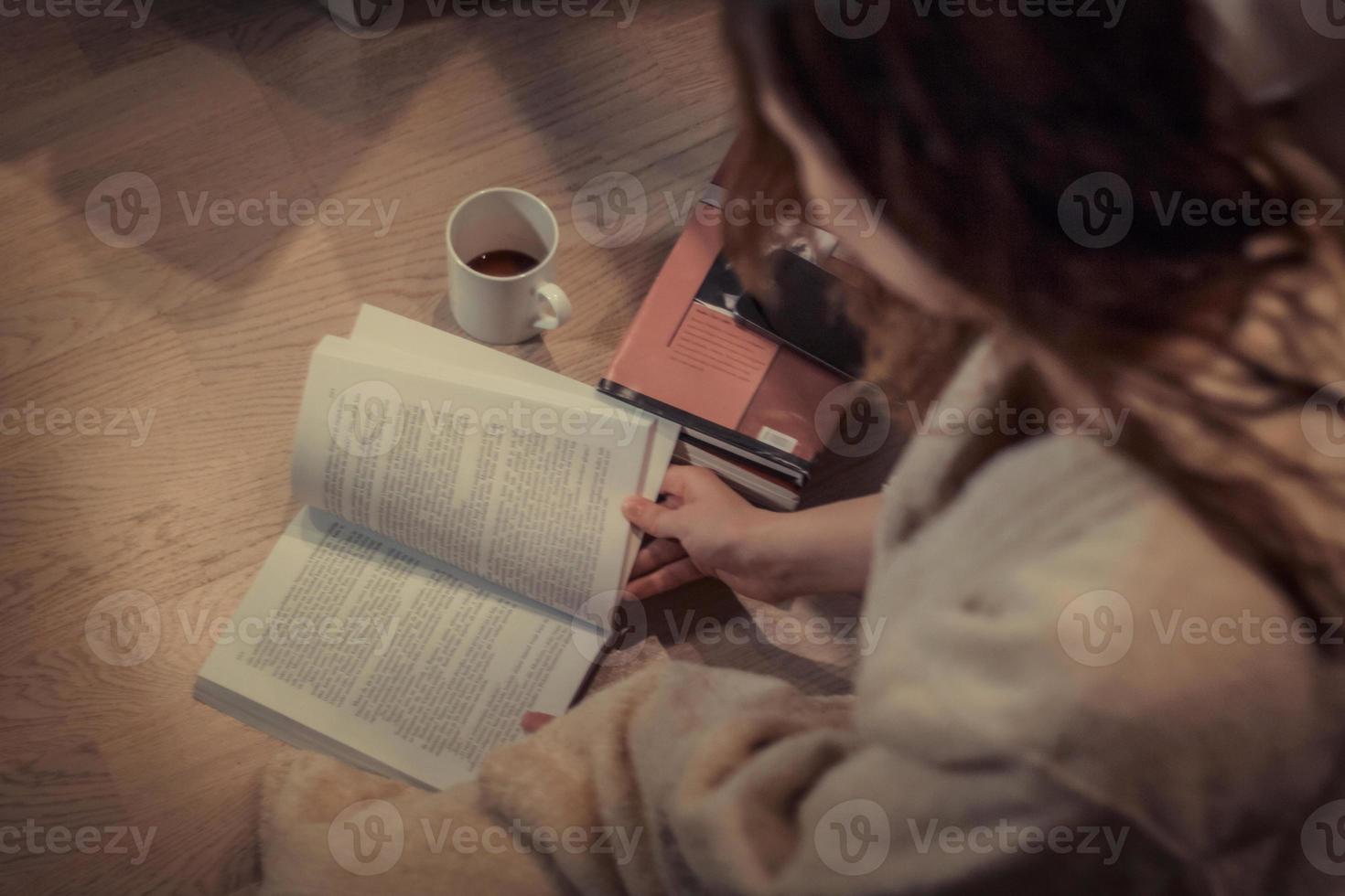 Reading a book in the evening. photo