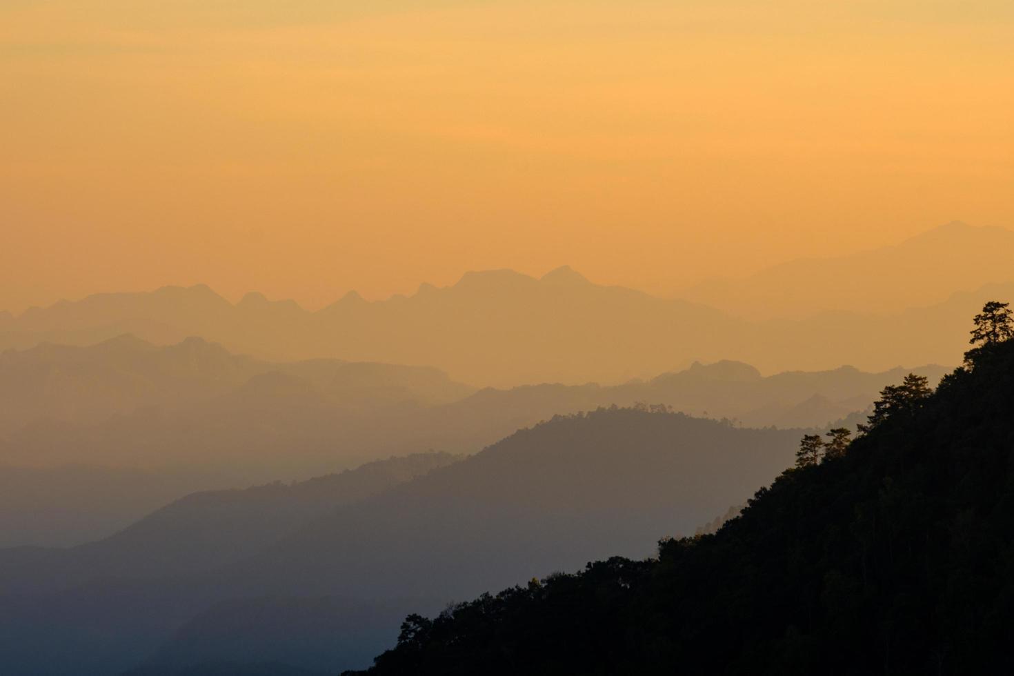 Beautiful mountain landscape at sunset at Monson viewpoint Doi AngKhang, Chaingmai Thailand photo