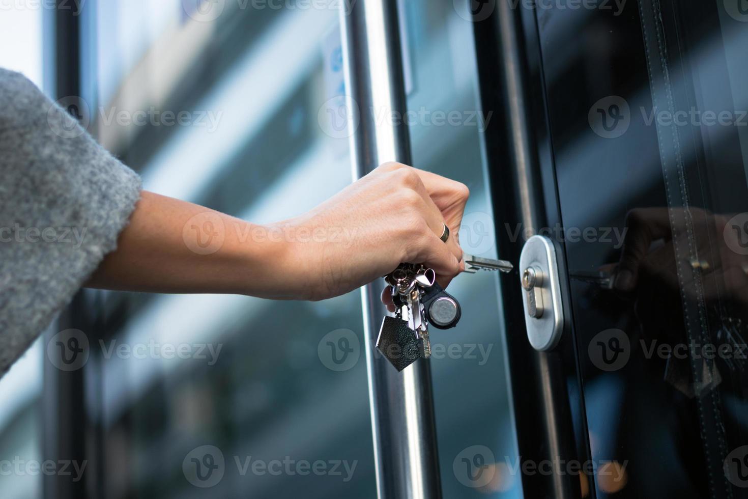 Locking door with a key. photo