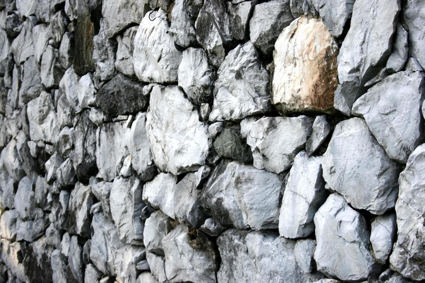 antiguo muro de piedra para el fondo foto