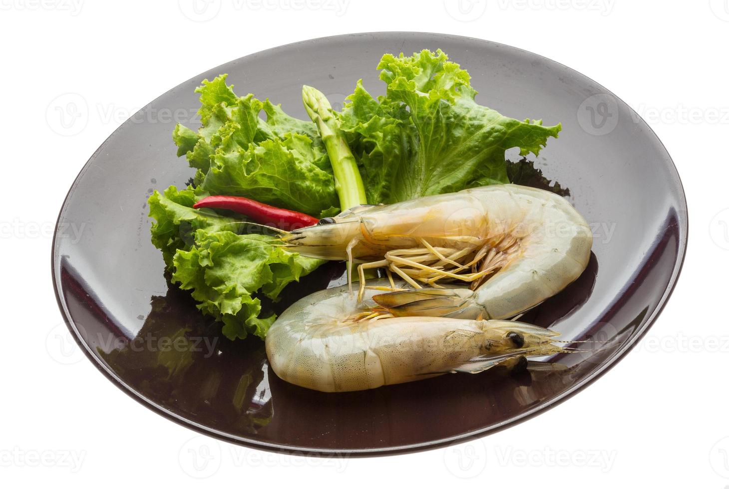 Tiger prawn on the plate and white background photo