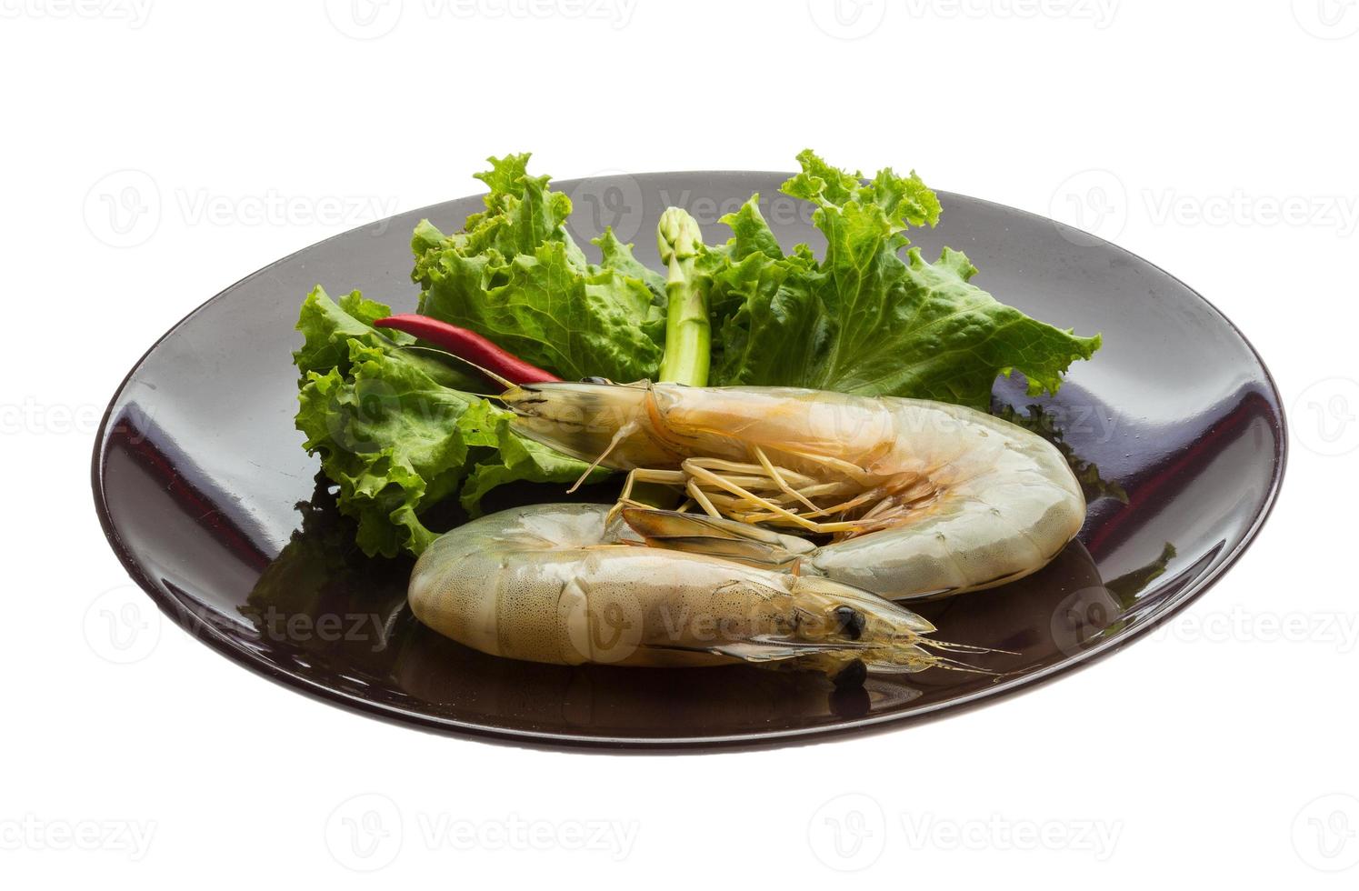 Tiger prawn on the plate and white background photo