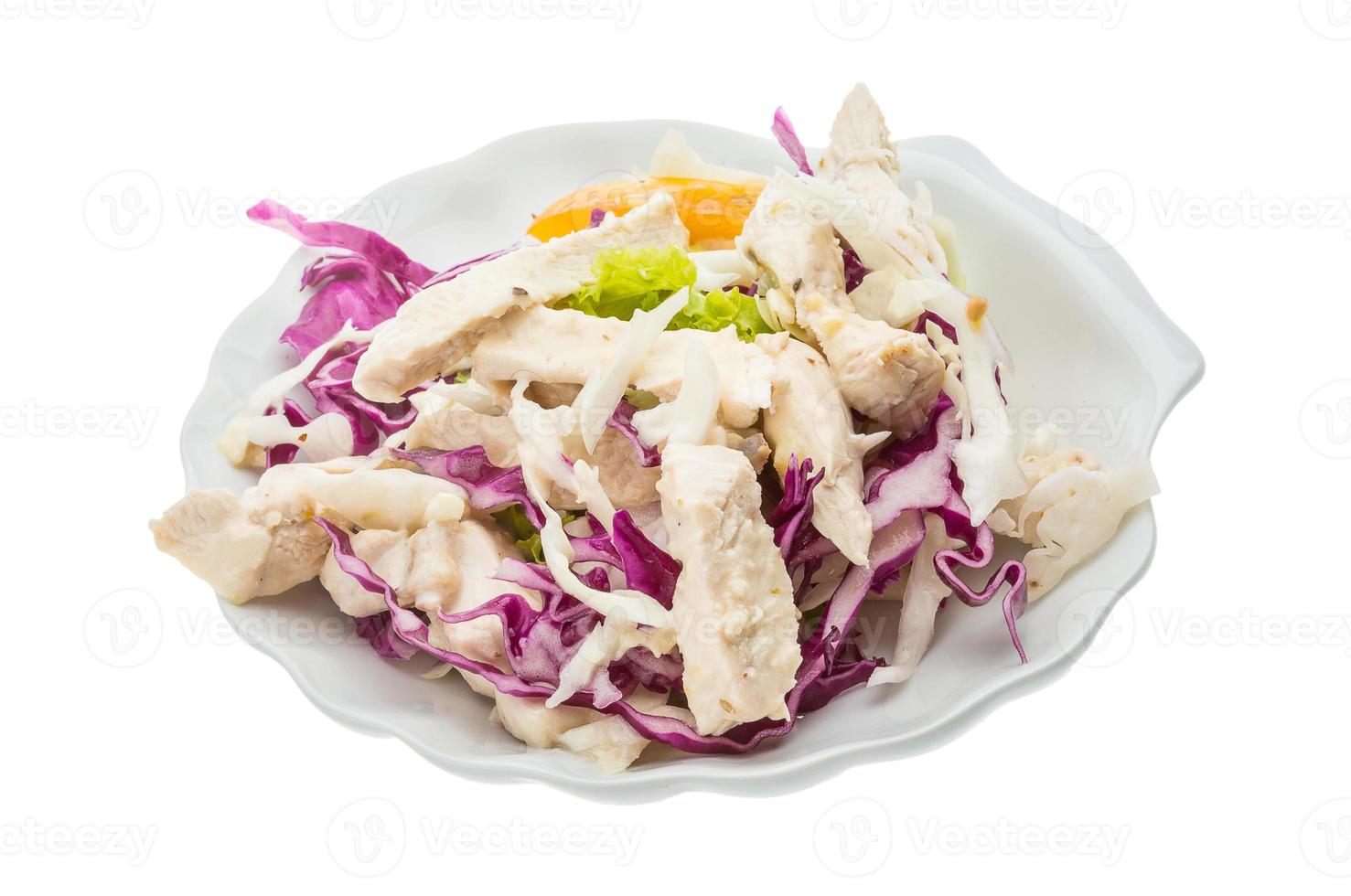 Chicken salad on the plate and white background photo