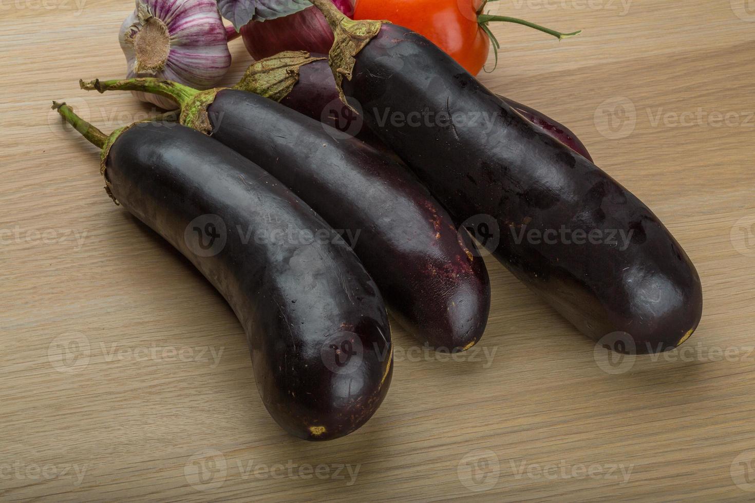 Eggplants on the board photo