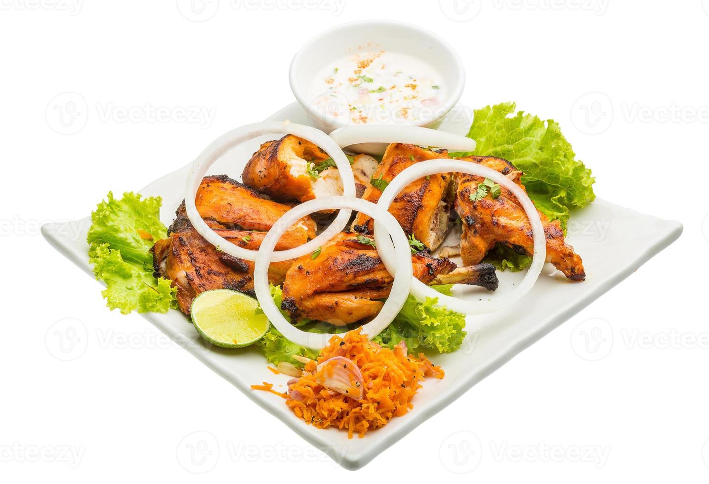 Tandori Chicken on the plate and white background photo