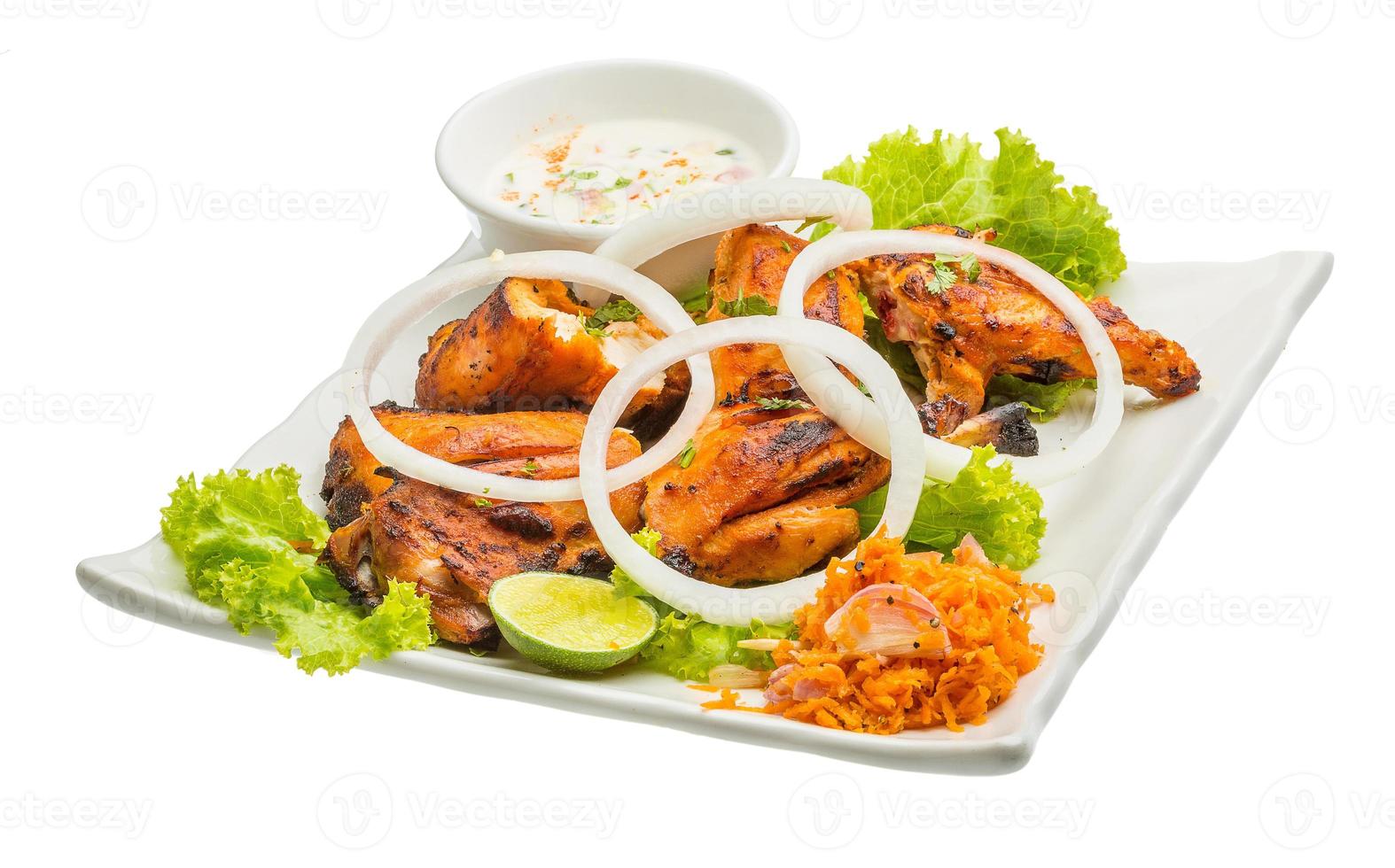 Tandori Chicken on the plate and white background photo