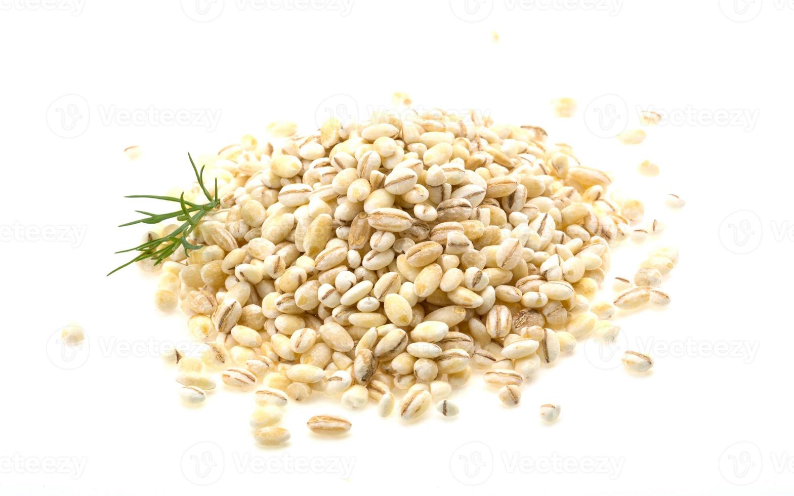 Pearl barley on white background photo