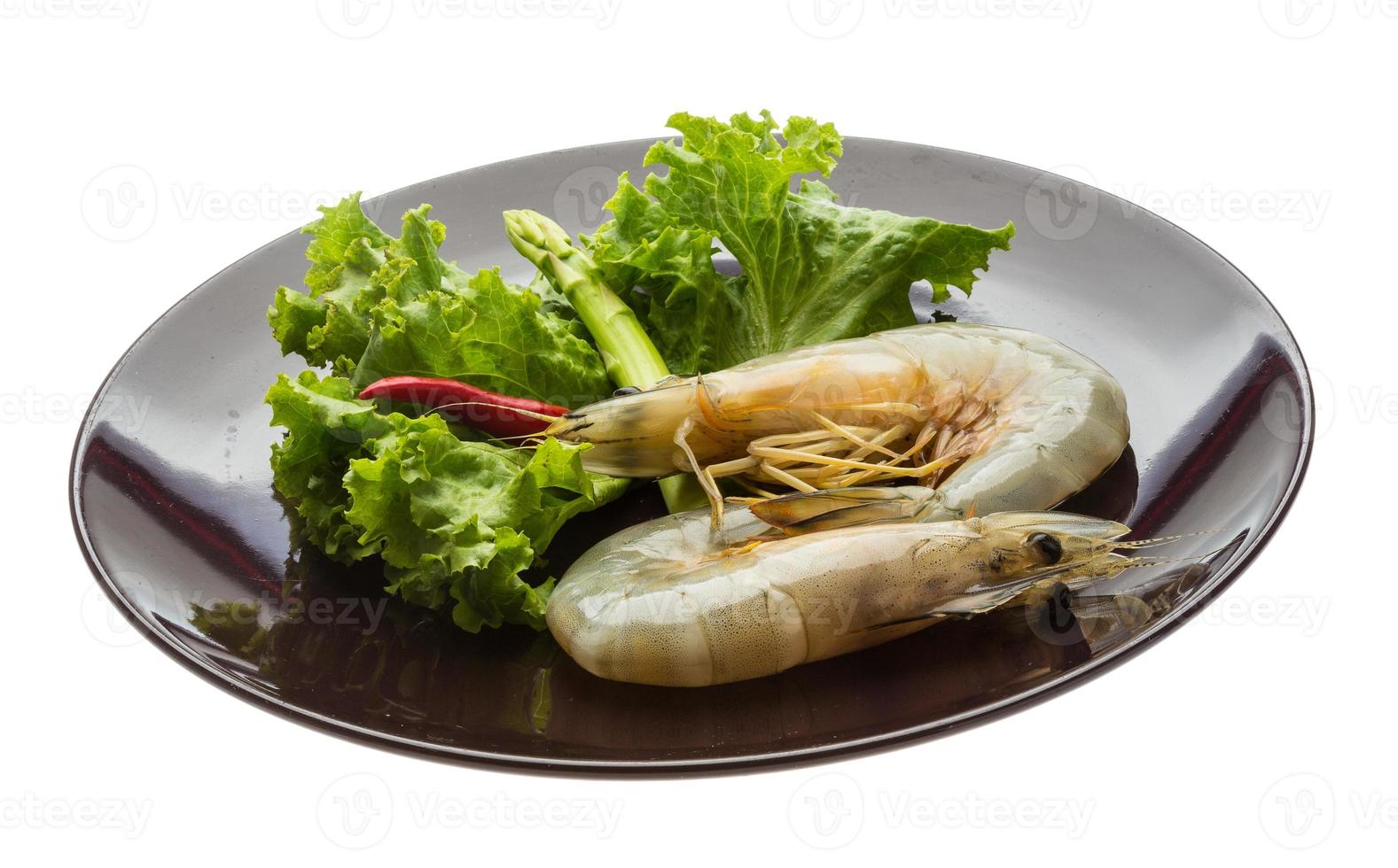 Tiger prawn on the plate and white background photo