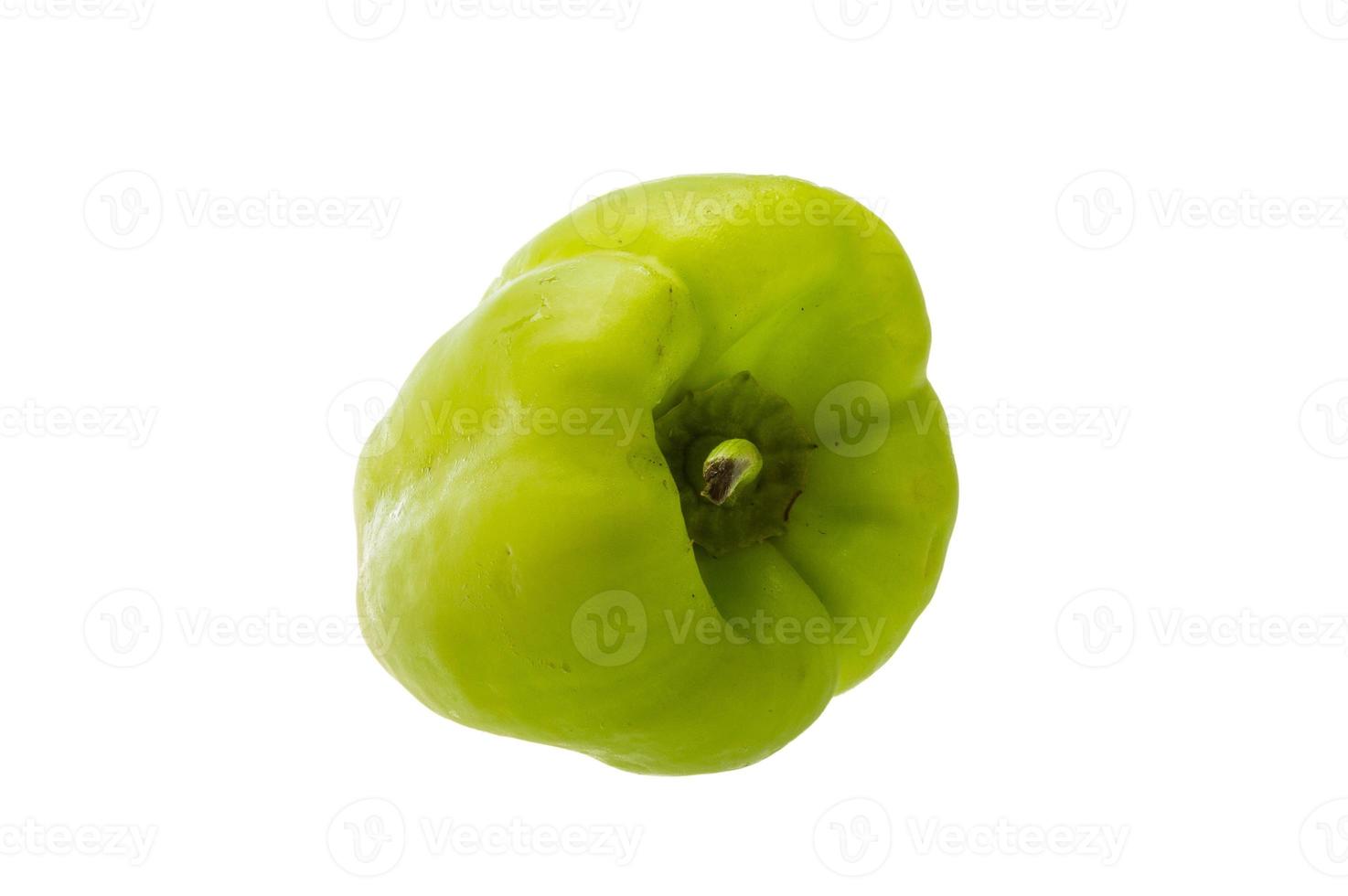 Green bell pepper on white background photo