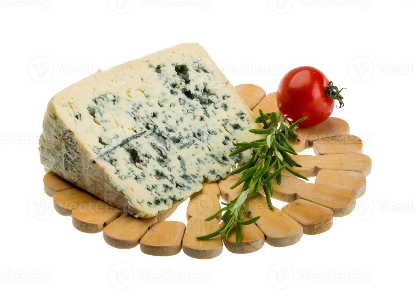 Blue cheese on white background photo