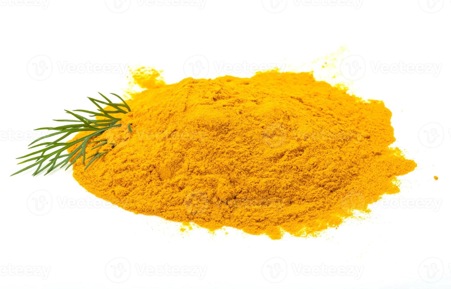 Curcuma powder on white background photo