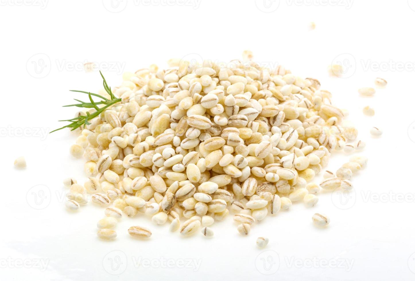 Pearl barley on white background photo