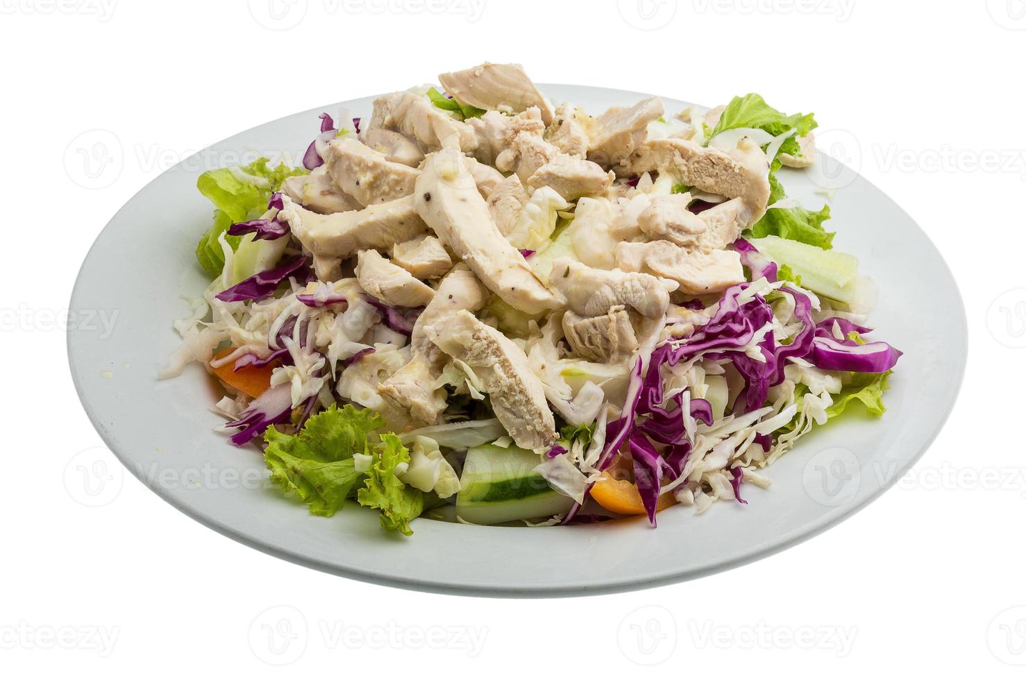 Chicken salad on the plate and white background photo