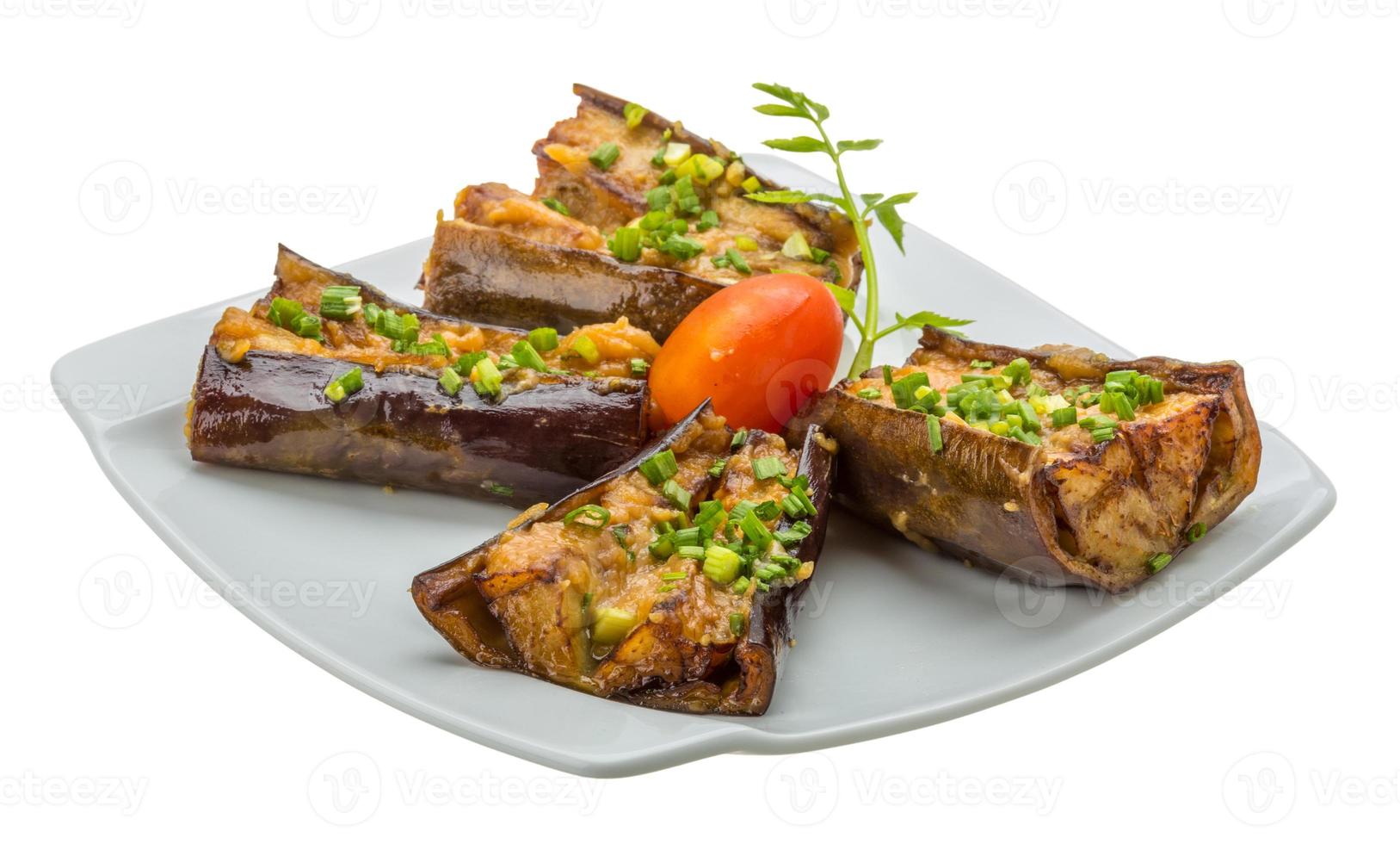 Grilled eggplant on the plate and white background photo