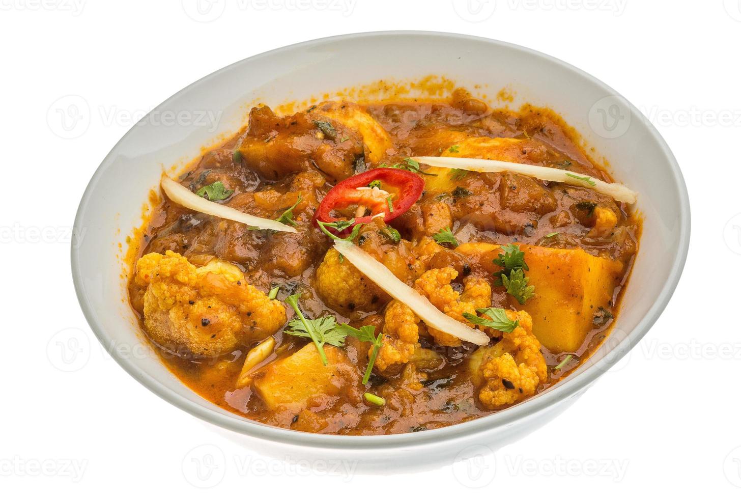 Alu Gobi in a bowl on white background photo