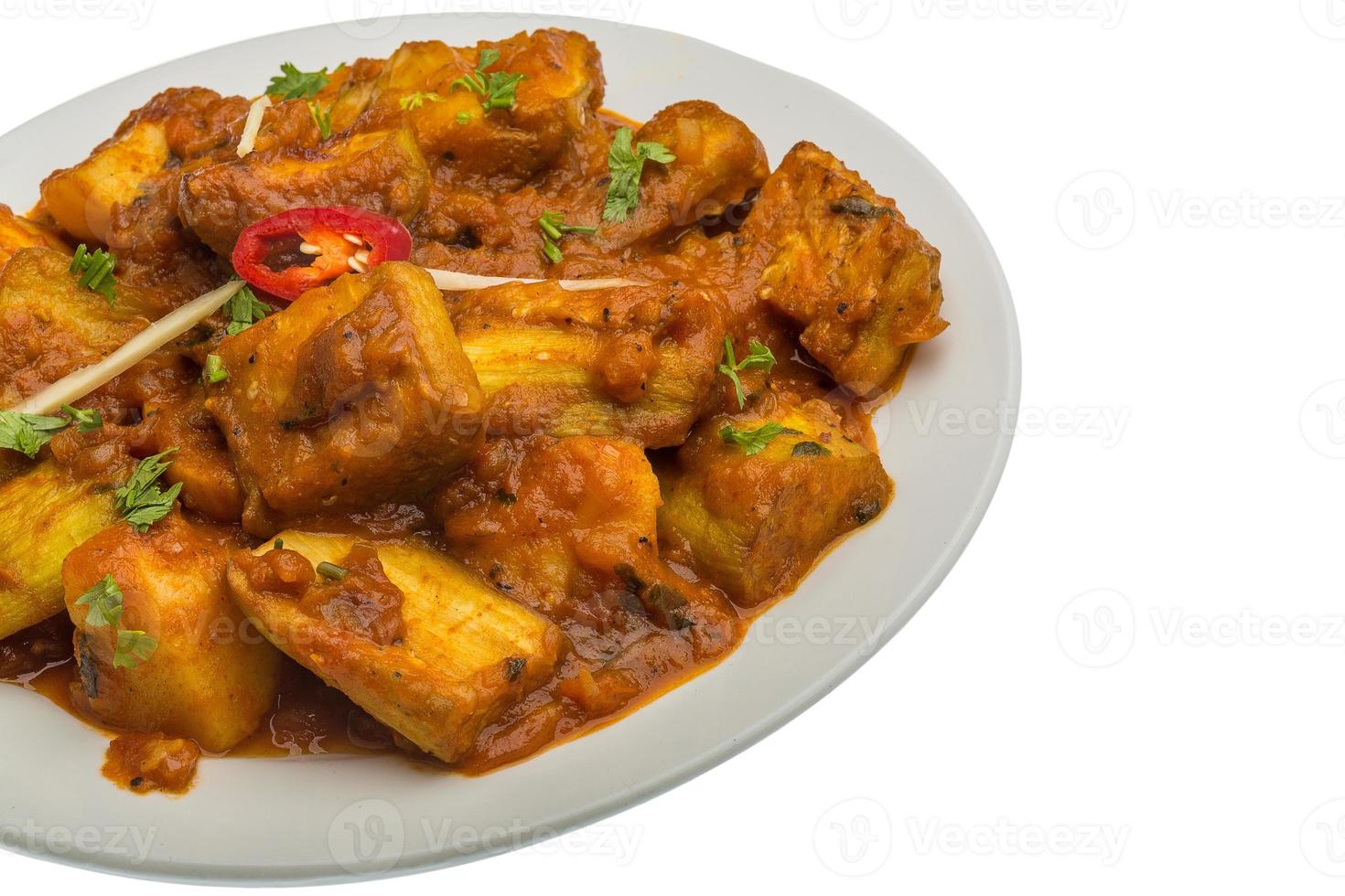 Alu Bengan on the plate and white background photo