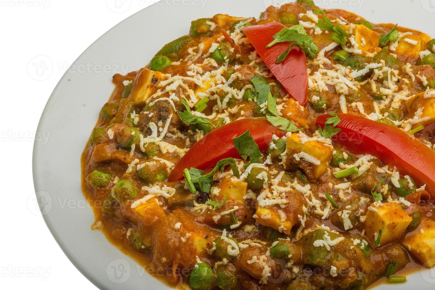 Mutter Paneer on the plate and white background photo