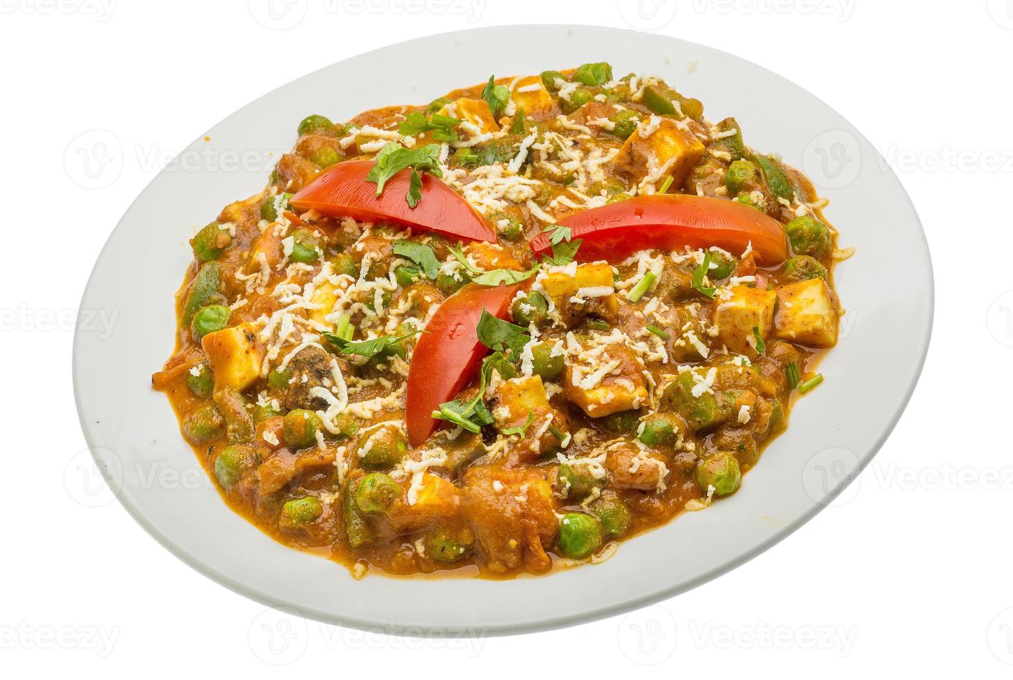 Mutter Paneer on the plate and white background photo