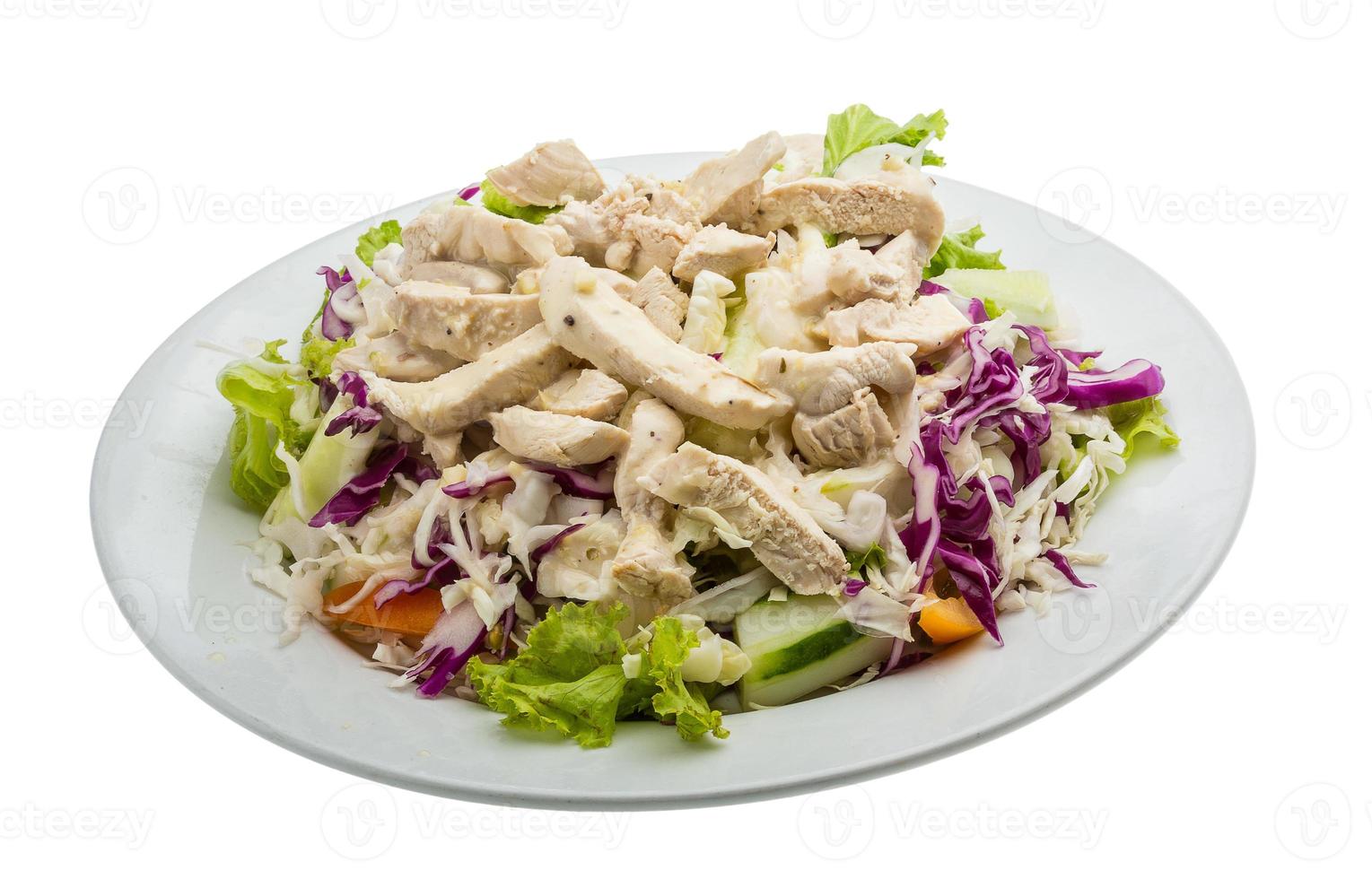 Chicken salad on the plate and white background photo