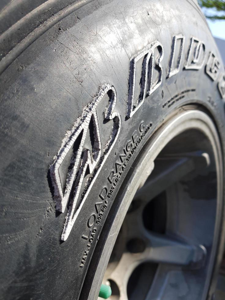West Java, Indonesia on April 2021. Close up photo of a car tire with the Bridgestone brand.