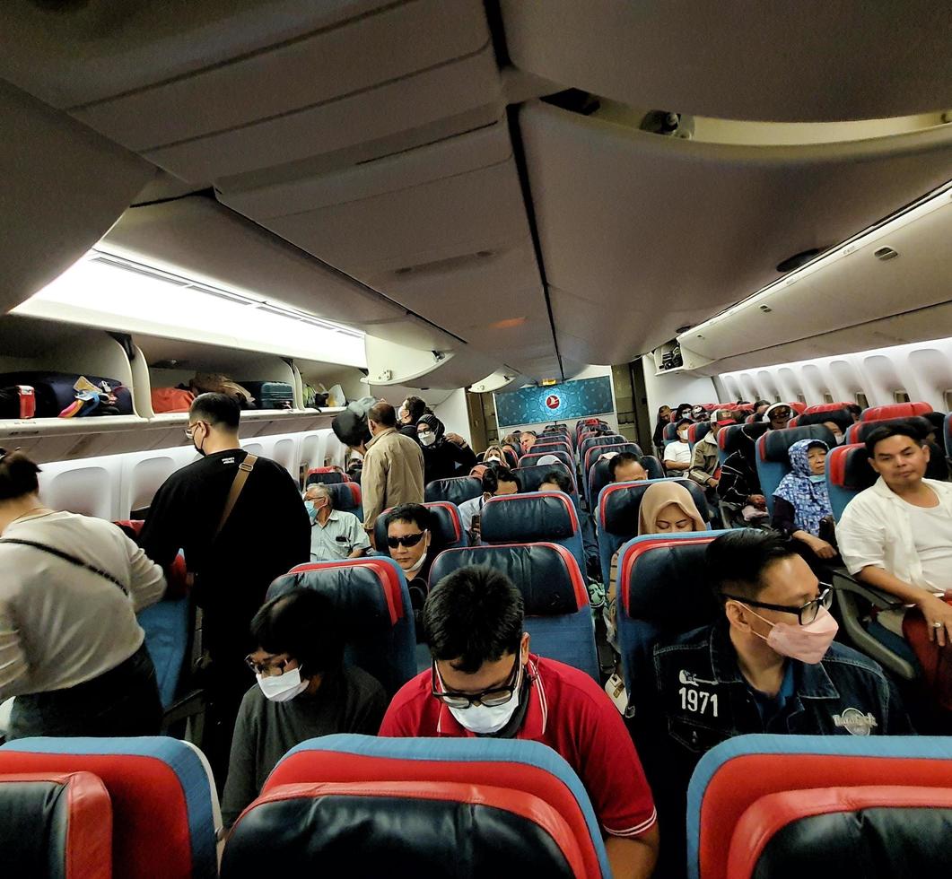 Istanbul, Turkey on July 2022. Situation from the cabin of a Turkish Airlines economy class plane where the seat consists of three parts, right, left and center. photo