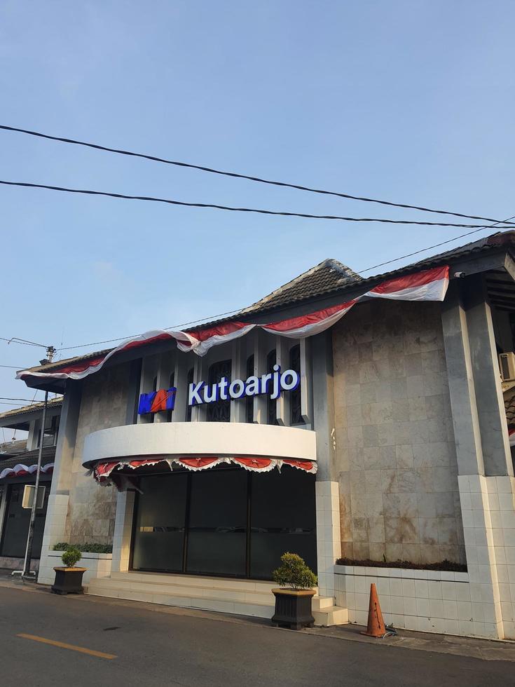 Sign at the entrance of the Kutoarjo train station at noon. photo