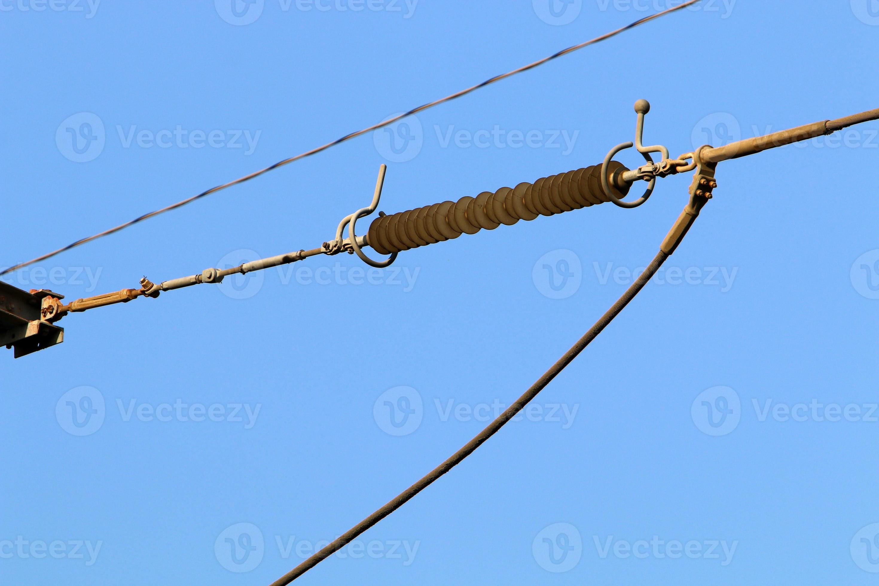 Electrical wires carrying high voltage current. 11243304 Stock Photo at