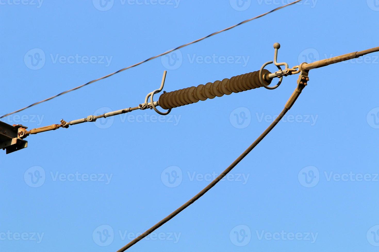 Electrical wires carrying high voltage current. photo