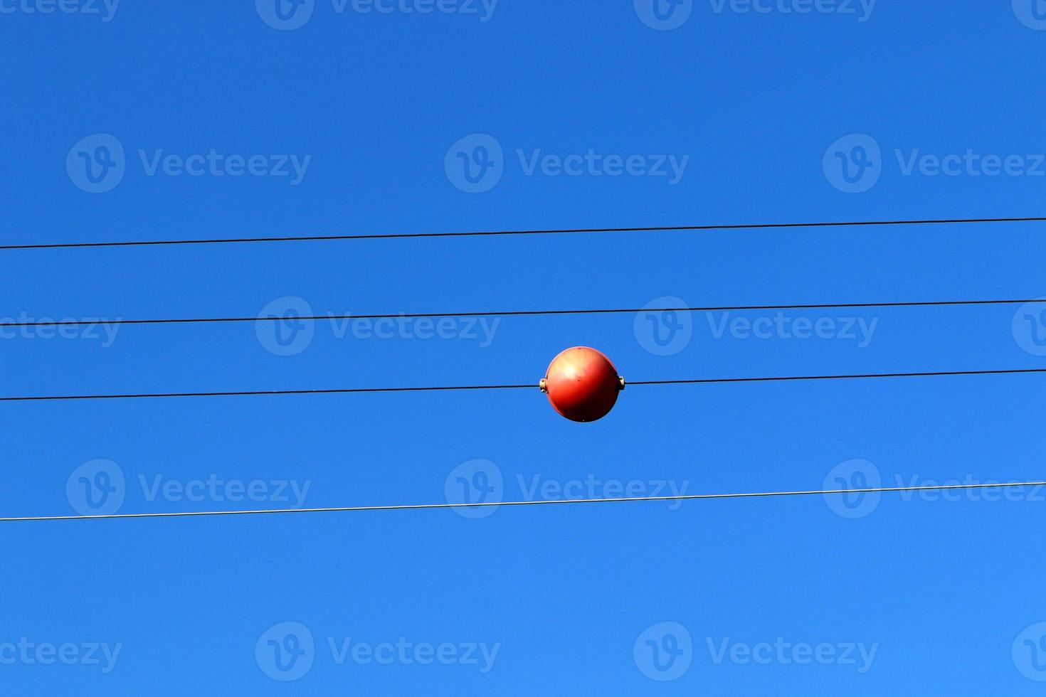 Electrical wires carrying high voltage current. photo