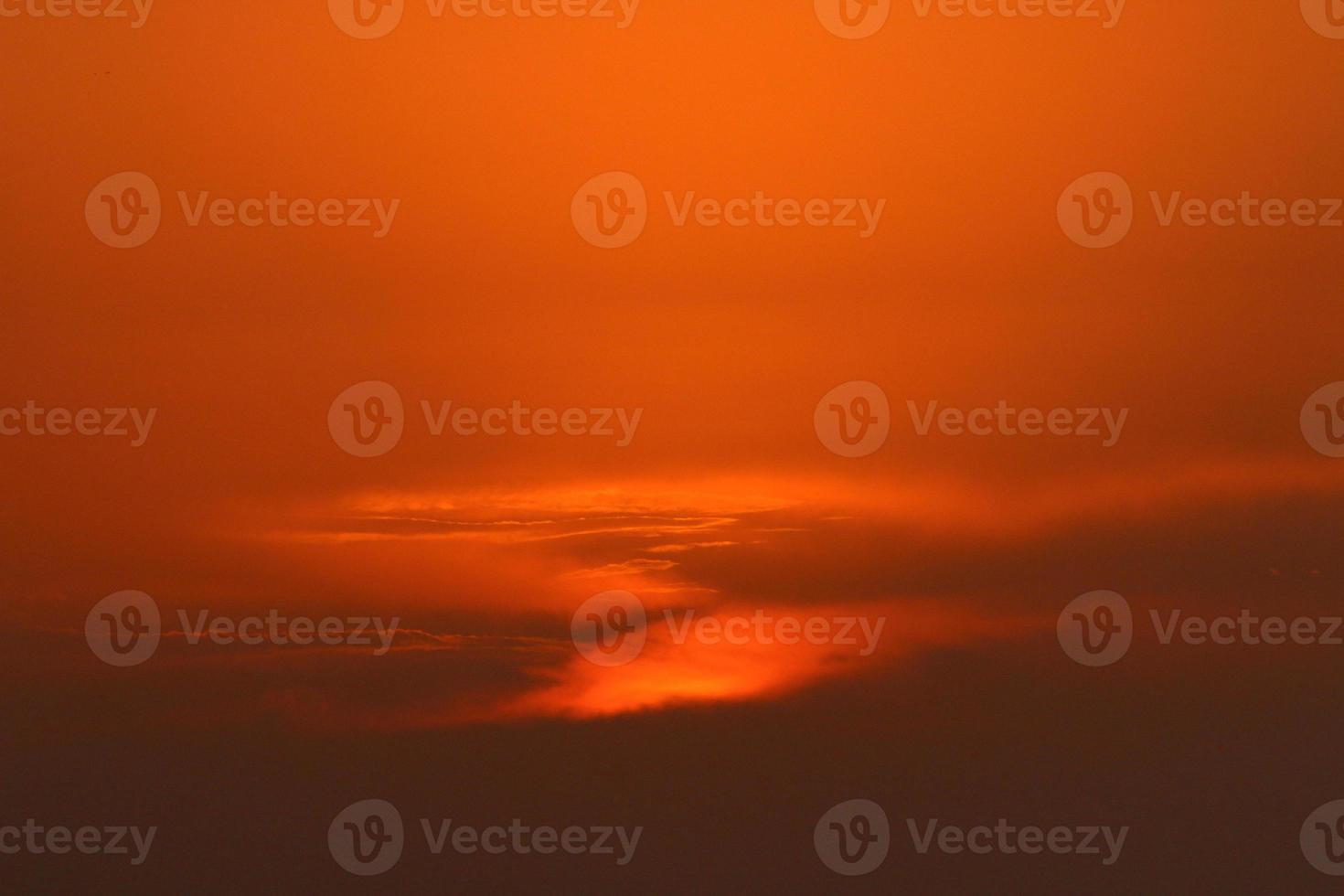 The sun sets below the horizon on the Mediterranean Sea in northern Israel. photo