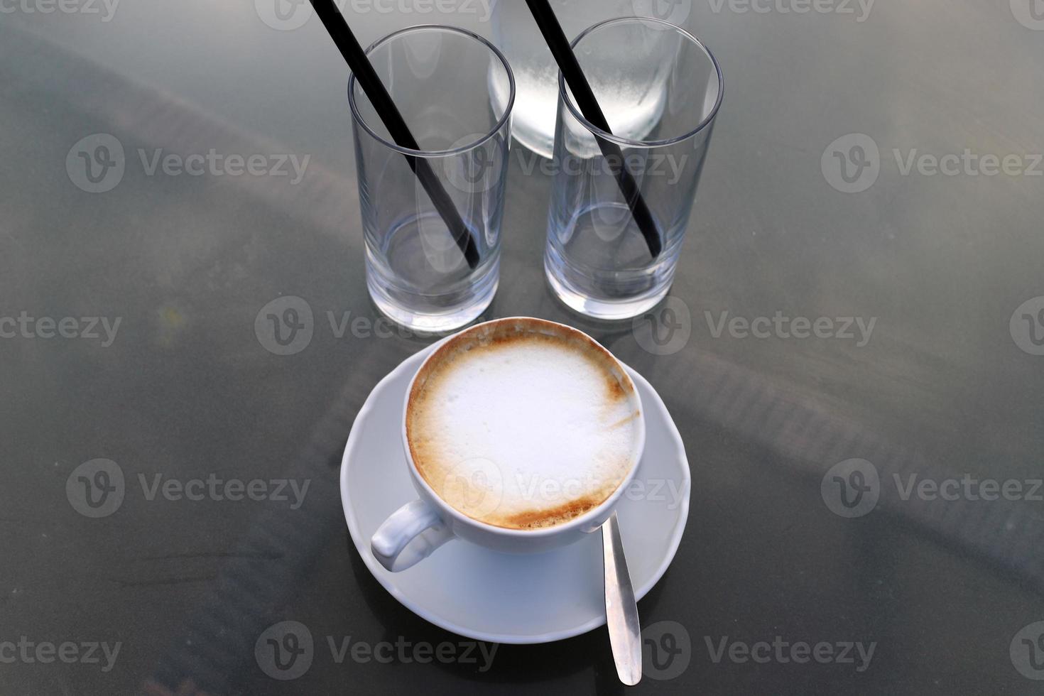 Hot coffee on the table in a restaurant. photo