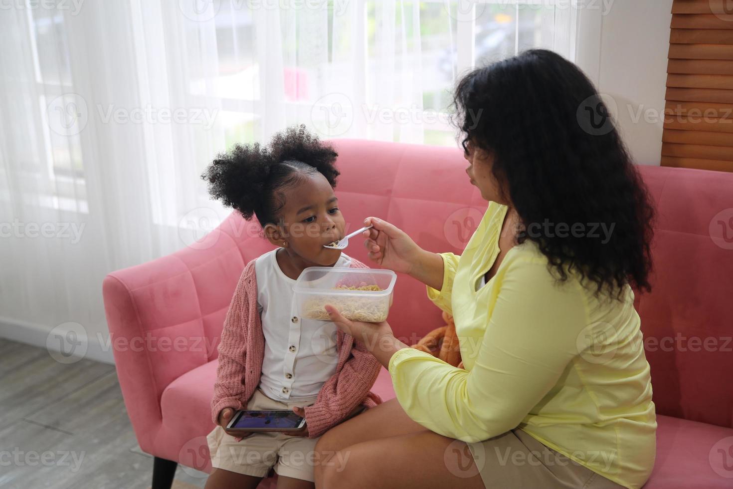 Joyful multiethnic family and their leisure at home photo