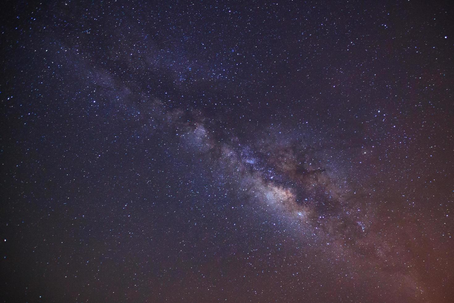 milky way galaxy with cloud and space dust in the universe, Long exposure photograph, with grain. photo