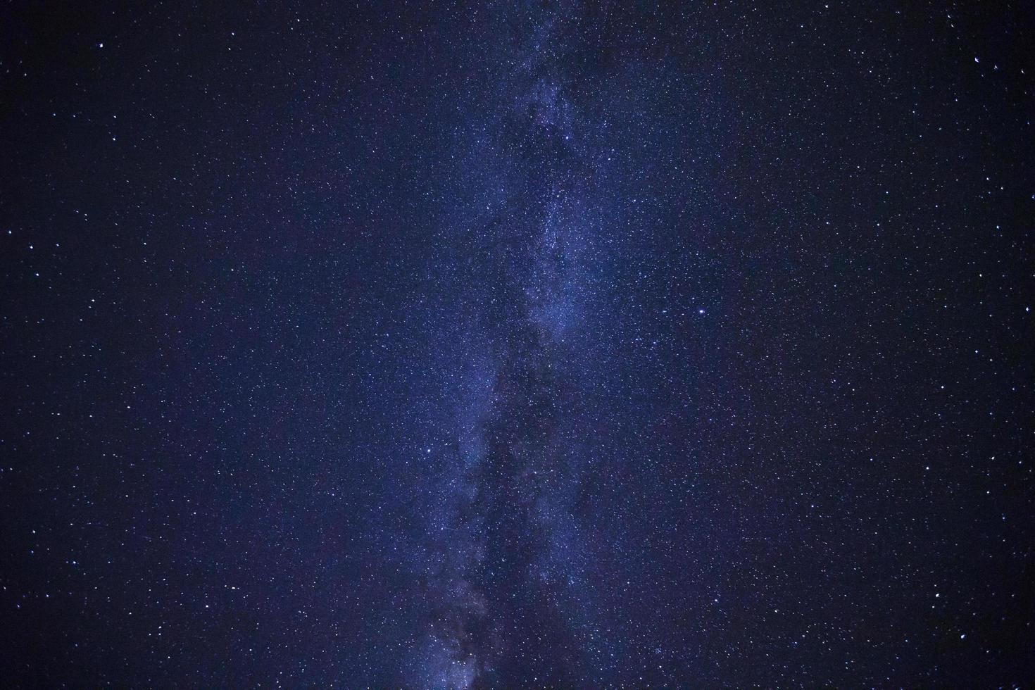 Milky way galaxy with stars and space dust in the universe, Long exposure photograph, with grain. photo
