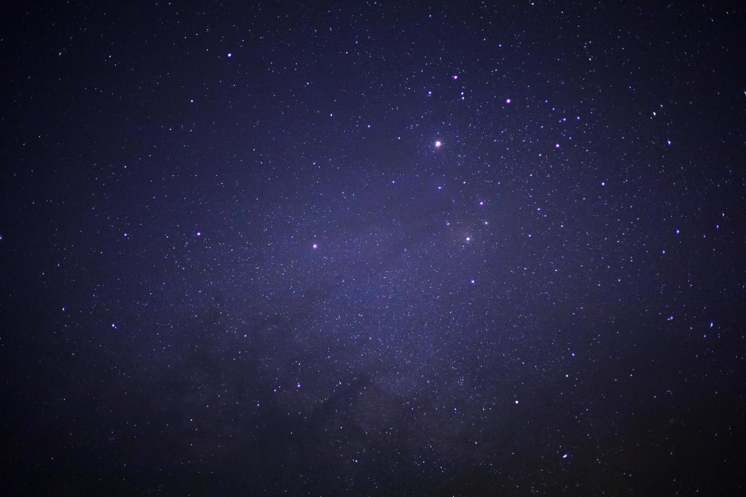 Starry night sky and milky way galaxy with stars and space dust in the universe photo