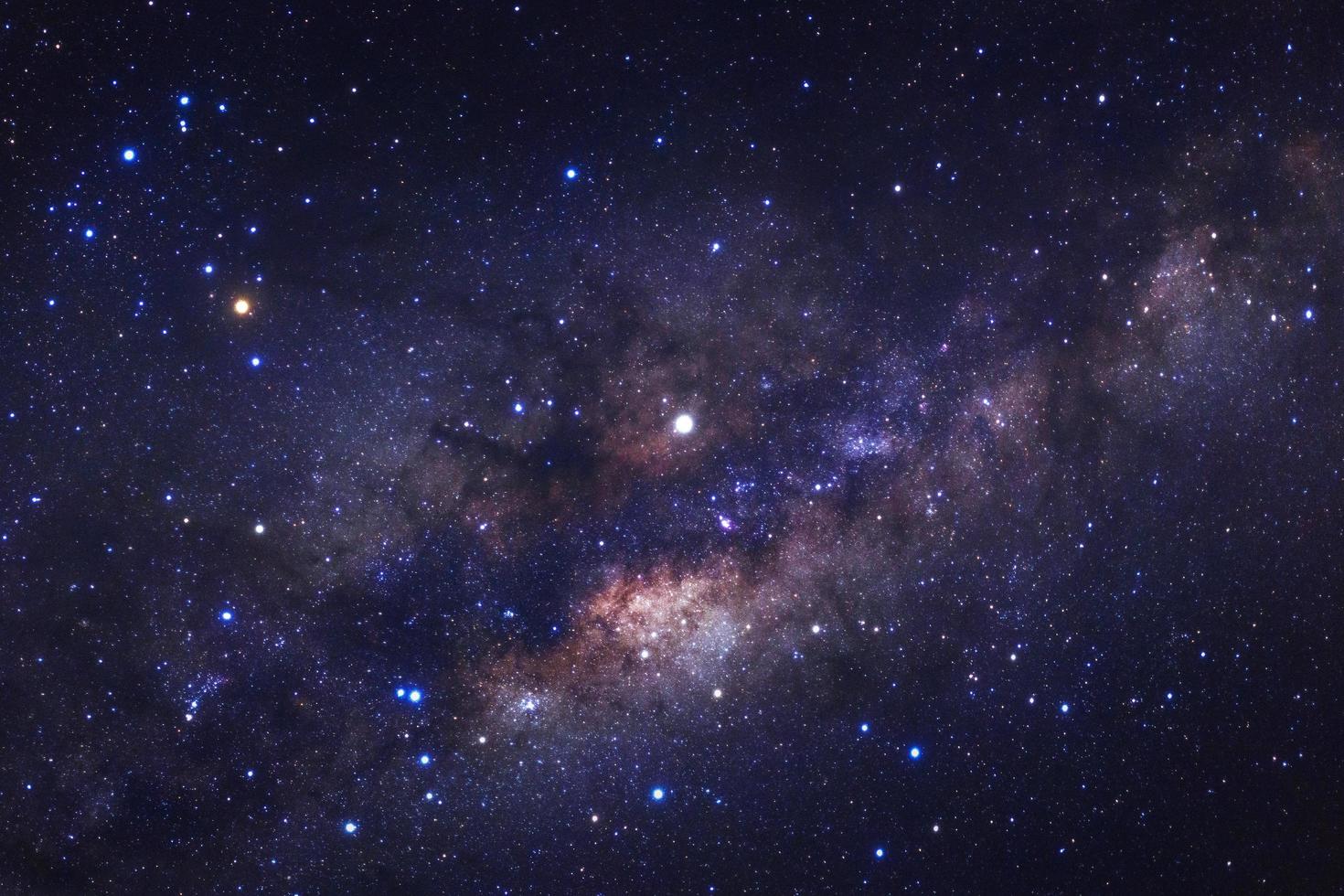 Milky way galaxy with stars and space dust in the universe, Long exposure photograph, with grain. photo