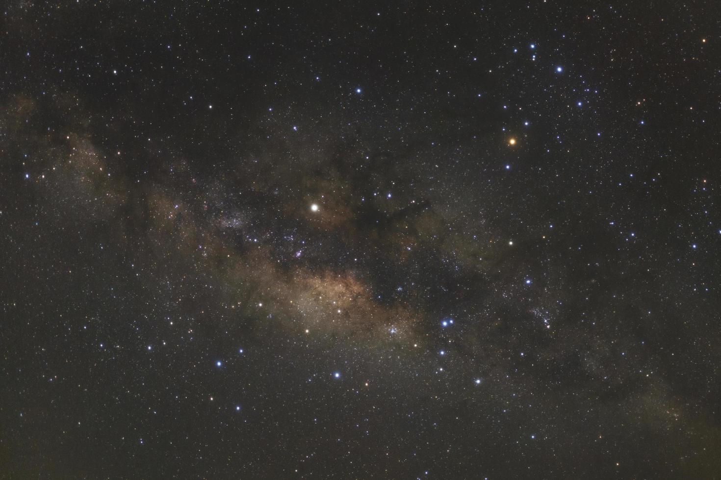 Milky way galaxy with stars and space dust in the universe, Long exposure photograph, with grain. photo