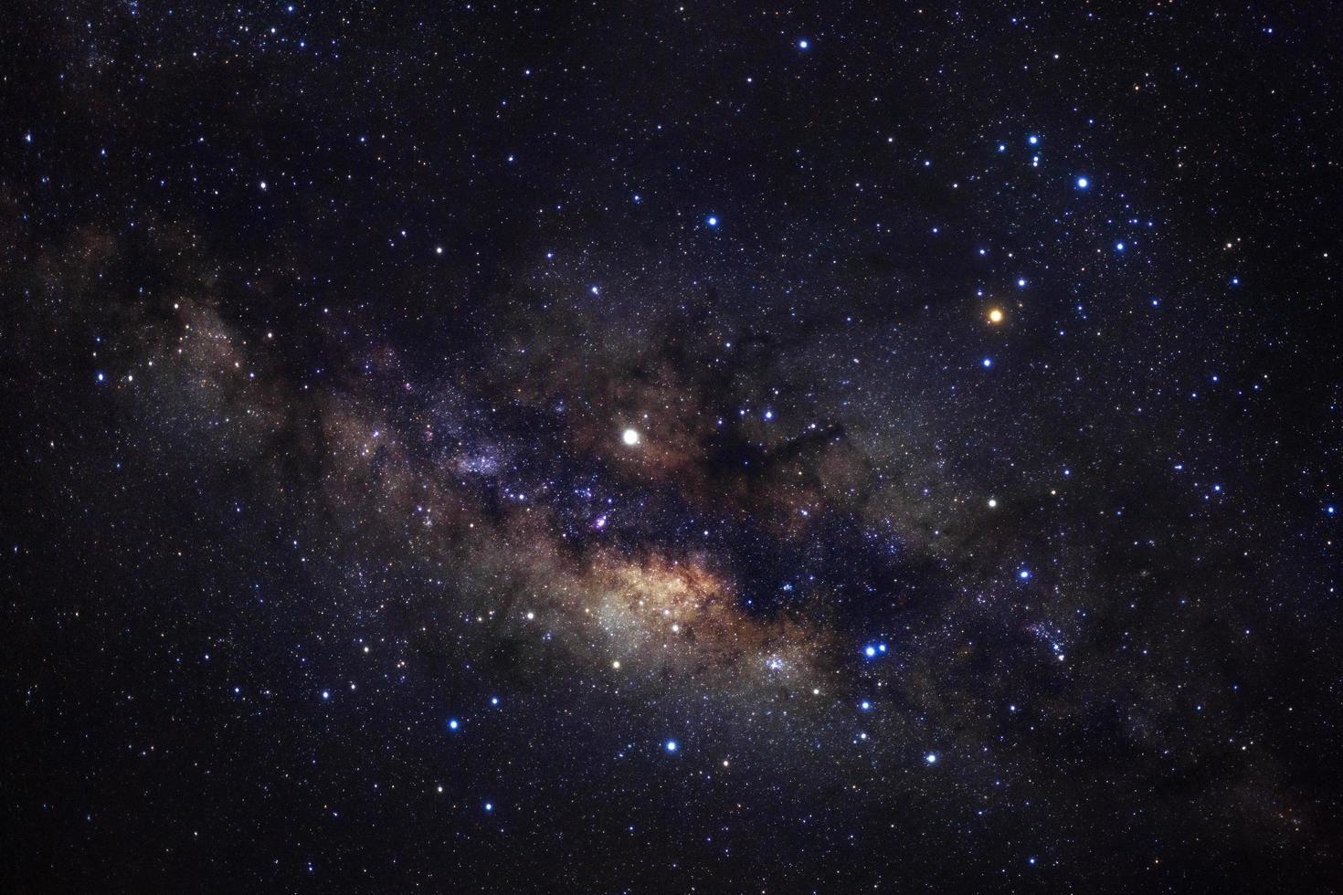 Milky way galaxy with stars and space dust in the universe, Long exposure photograph, with grain. photo