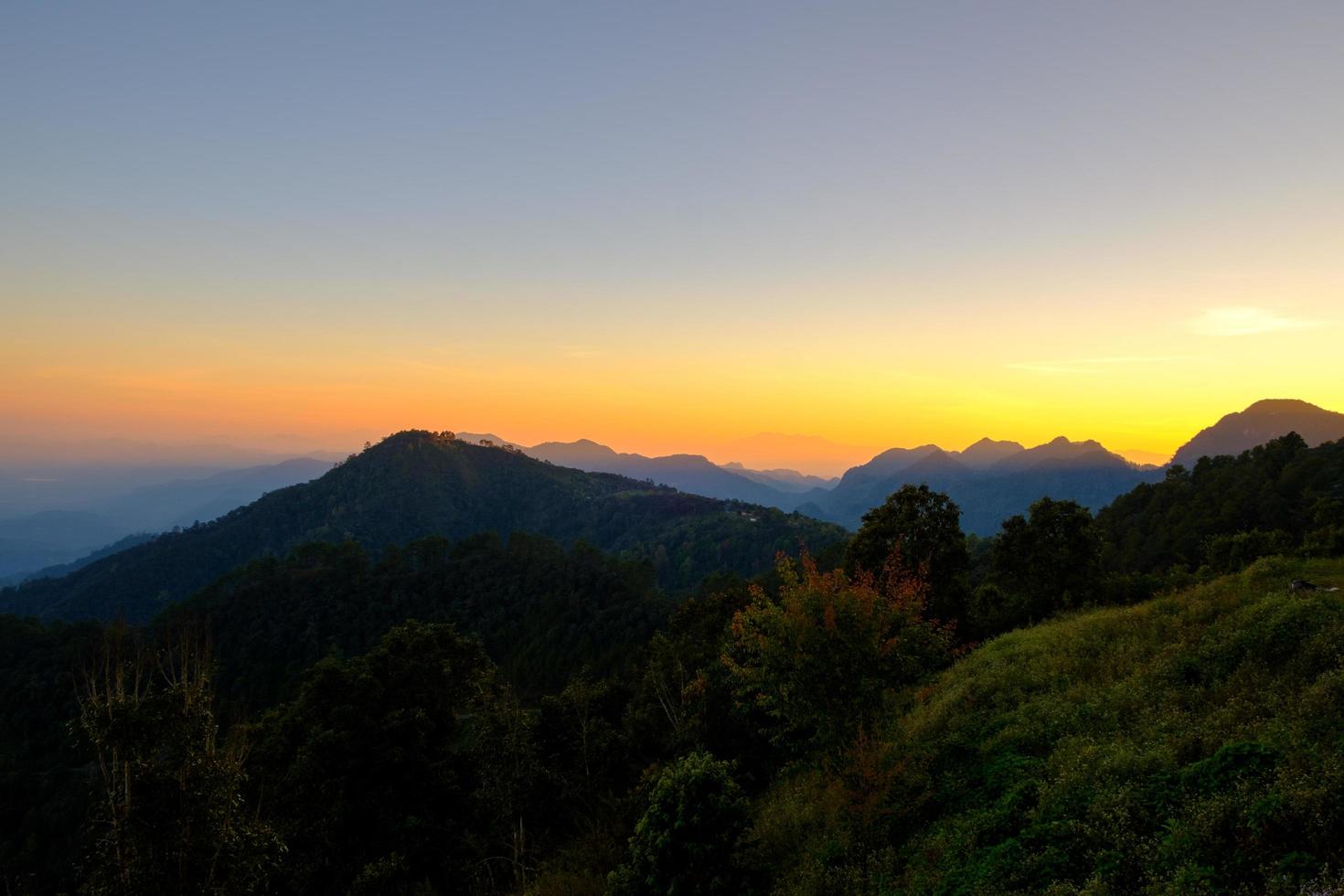 Beautiful mountain landscape at sunset at Monson viewpoint Doi AngKhang, Chaingmai Thailand photo