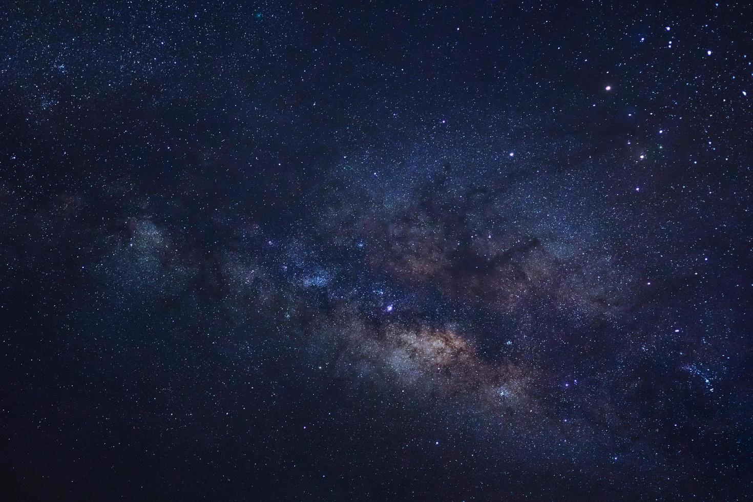 Starry night sky and milky way galaxy with stars and space dust in the universe photo