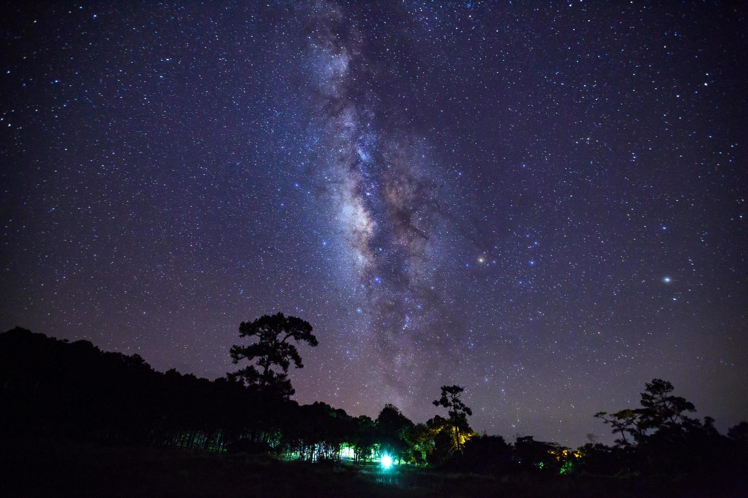 Starry night sky and milky way galaxy with stars and space dust in the universe photo