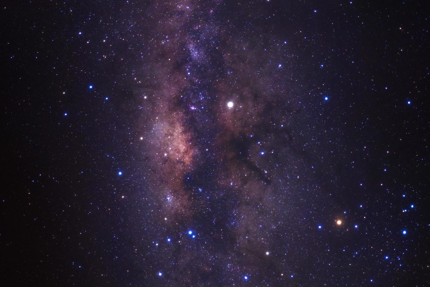 Milky way galaxy with stars and space dust in the universe, Long exposure photograph, with grain. photo