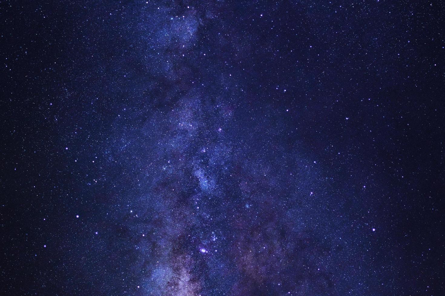 Starry night sky and milky way galaxy with stars and space dust in the universe photo