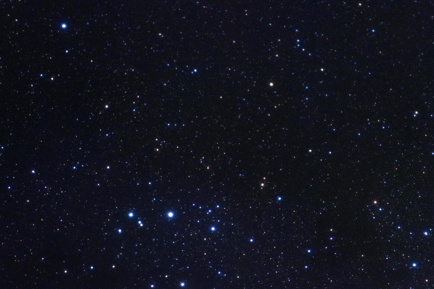 Starry night sky, Milky way galaxy with stars and space dust in the universe, Long exposure photograph, with grain. photo