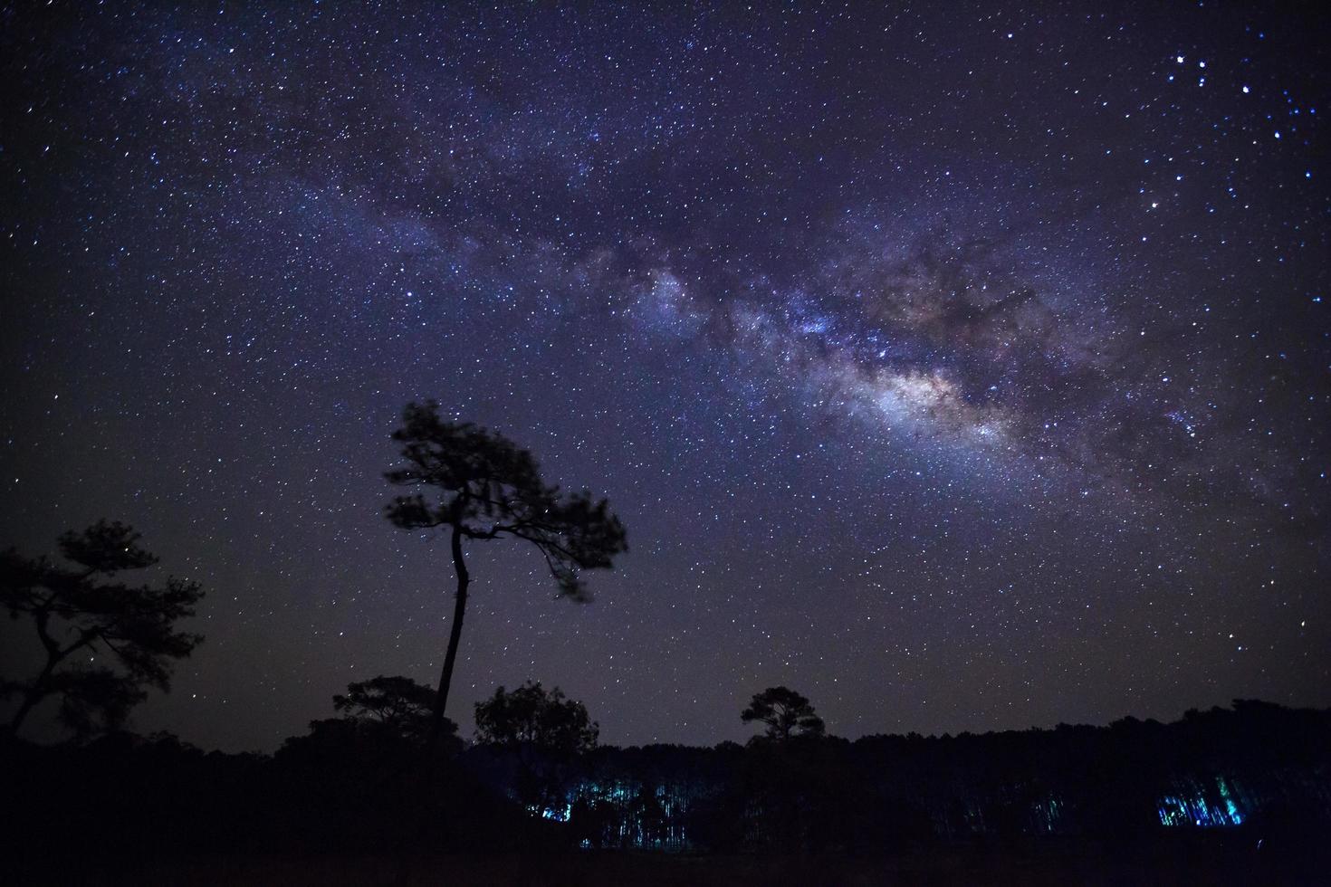 Starry night sky and milky way galaxy with stars and space dust in the universe photo