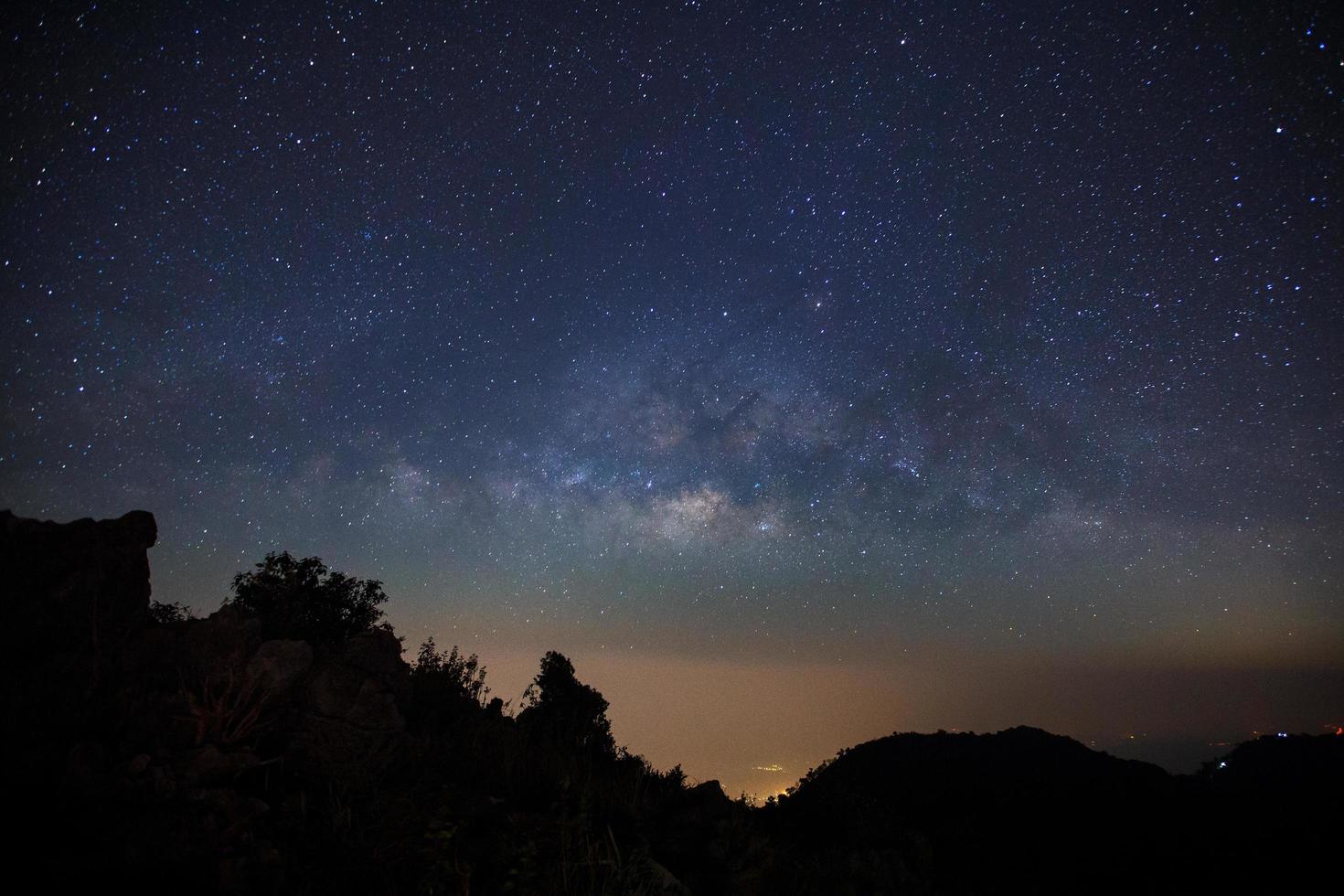 Milky Way Galaxy at Doi Luang Chiang Dao before sunrise. Long exposure photograph.With grain photo